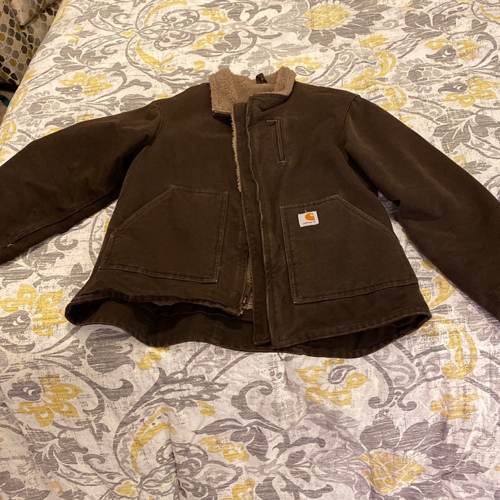 Carhartt jacket. Brown. Size medium. 2 inside pockets. 2 outside pockets.